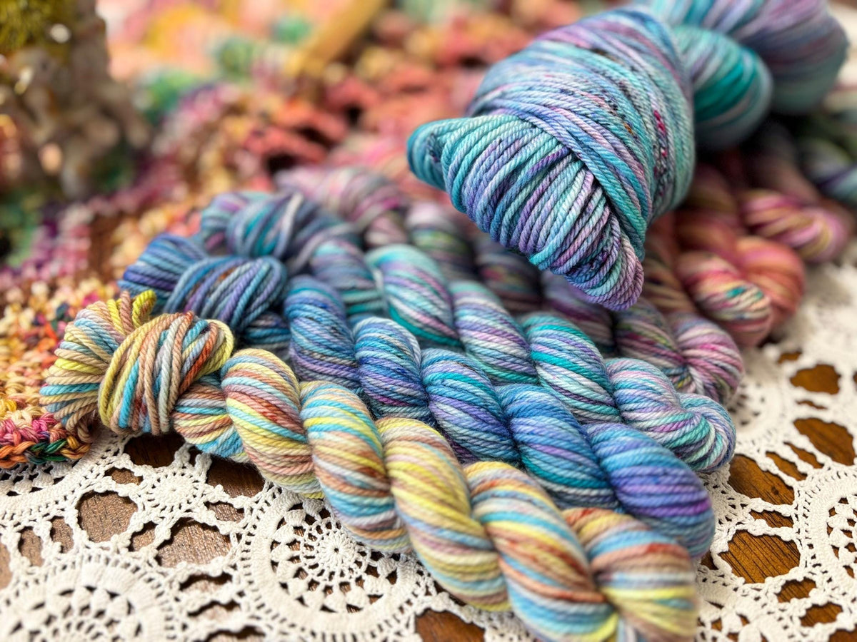 Mermaids Keep Deluxe Pack – 12 Mini Skeins + 100g Skein Hand Dyed Merino, 8ply, 752m, 75% Merino 25% Recycled Nylon